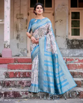 Elegant Floral Banarasi Silk Saree in Sky Blue and Blush Pink with Zari Weave and Tassels